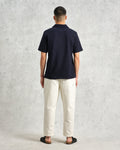 wax london men's Atwood - Navy Textured Organic Cotton Polo Shirt