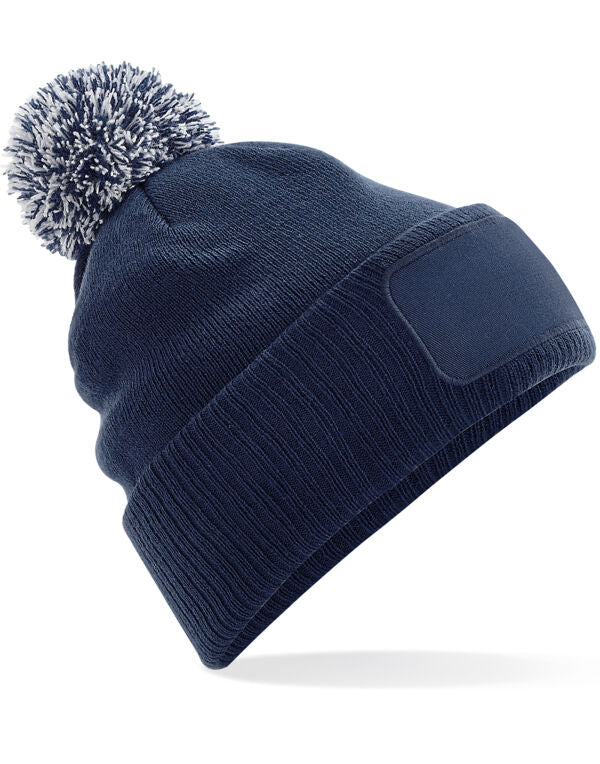 Beechfield Snowstar® Patch Beanie | Unisex | Pom-Pom | Soft Touch | 8 Colours | One Size - Hat - Logo Free Clothing